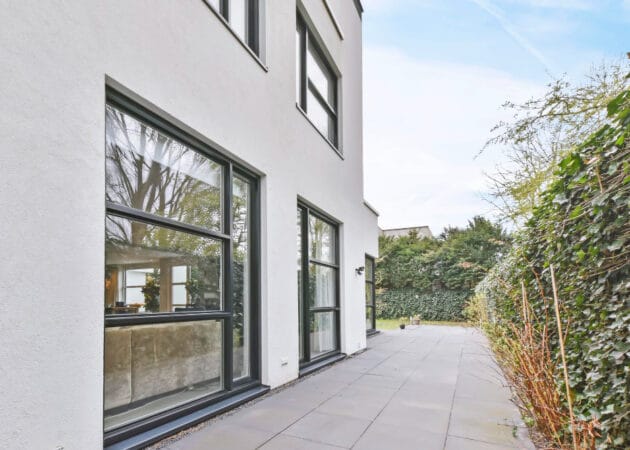 is stucco cheaper than siding
